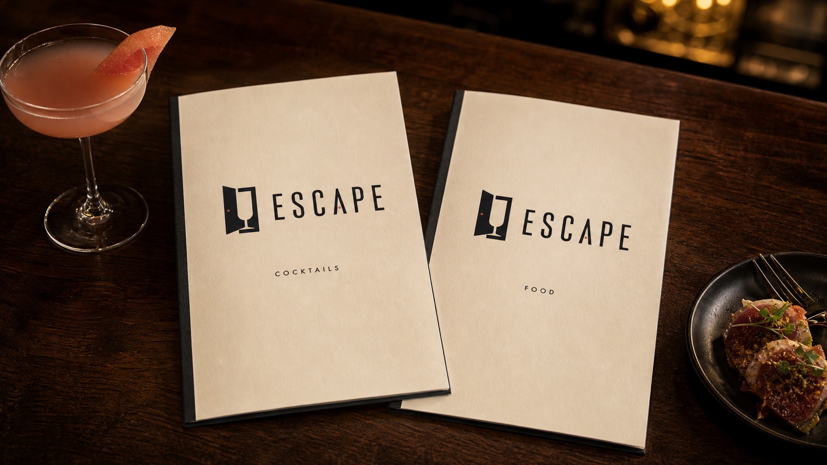 Escape logo printed on cocktail and food menu covers